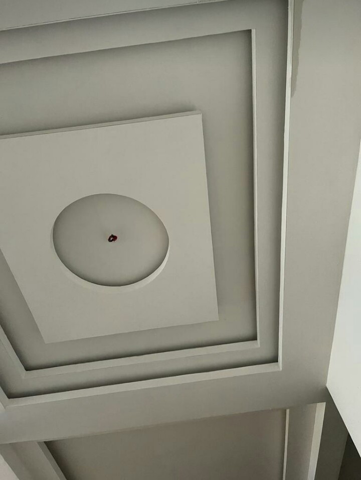Square POP ceiling with a central circular medallion